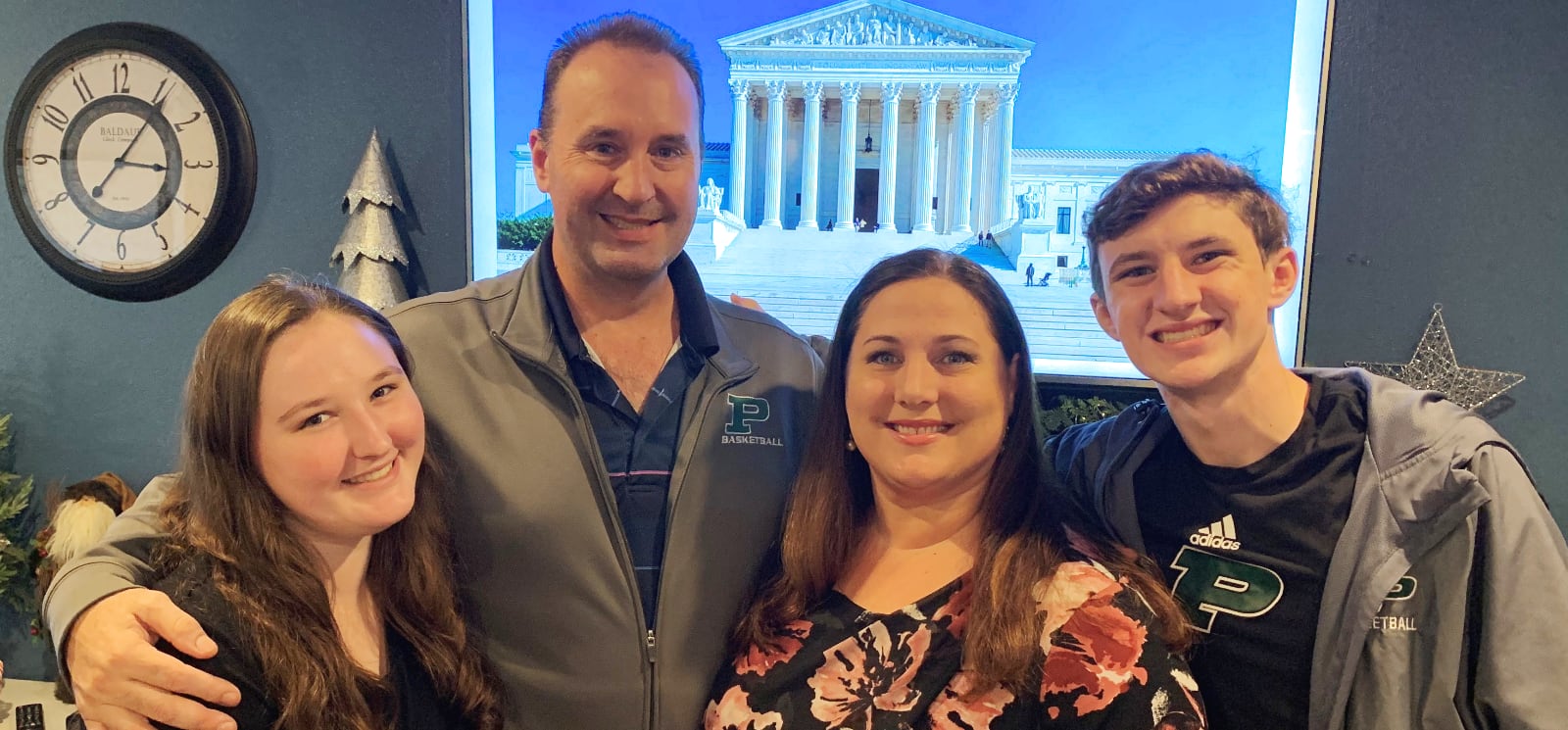 SDCBA member Rachel Allums and her family after getting her law degree